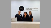 Dr Adam Najem